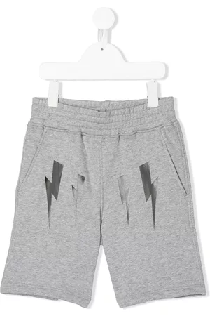 Neil Barrett Bermudas joggers con estampado