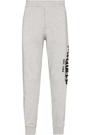 Alexander McQueen Pantalones de chándal con estampado de grafiti