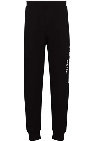 Alexander McQueen Pantalones de chándal con estampado de grafiti