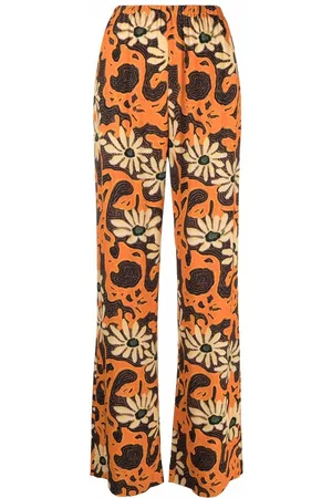 Nanushka Pantalones anchos con motivo floral