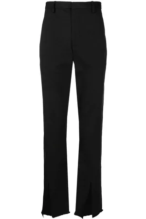 DION LEE Pantalones con abertura frontal