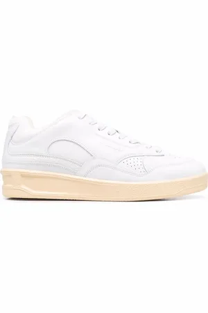 Jil Sander Zapatillas bajas con logo en relieve