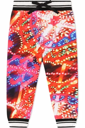 Dolce & Gabbana Pantalones ajustados con estampado Luminarie