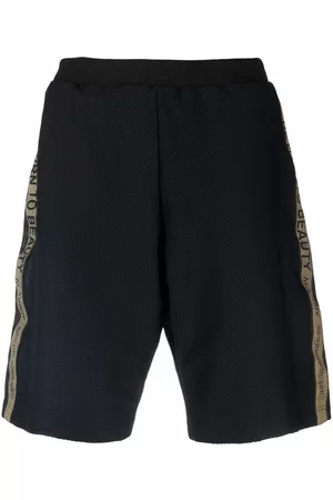 Etro Pantalones cortos con franjas del logo