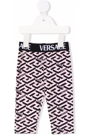 VERSACE Leggins con logo estampado