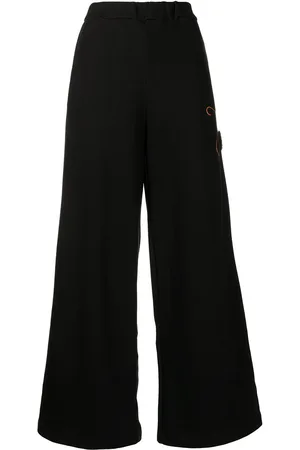 JOSHUA SANDERS Pantalones rectos elásticos