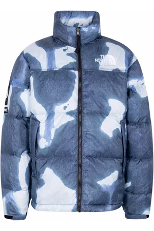 Supreme Chaqueta Nuptse con motivo vaquero de x TNF