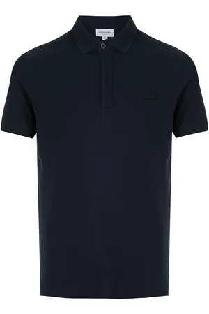 Lacoste Polo con parche del logo
