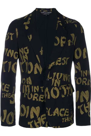Comme des Garçons Blazer con detalle de tipografía