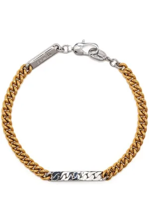 CAPSULE ELEVEN Pulsera Power Tag a dos tonos