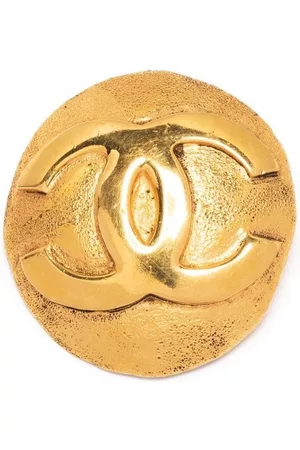 CHANEL Broche con relieve CC 1990
