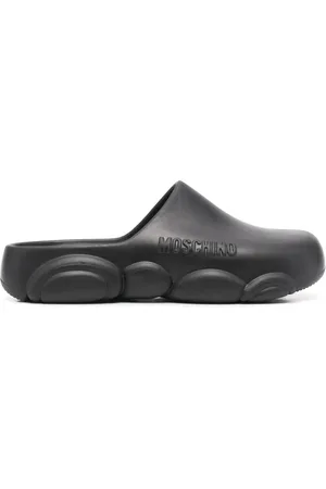 Moschino Mules con logo en relieve