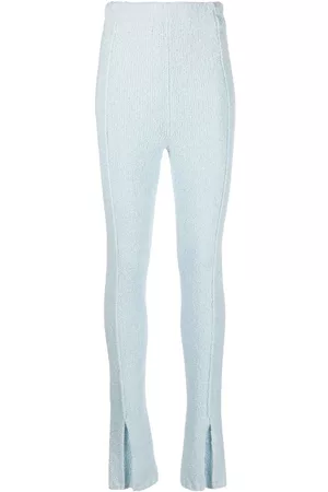 ROTATE Pantalones con bajos acampanados