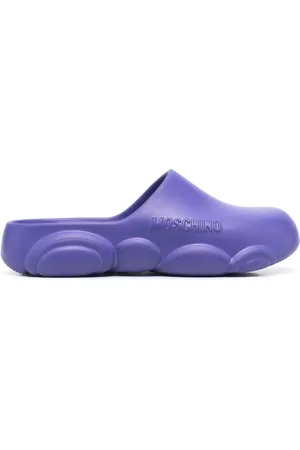 Moschino Mules con logo en relieve