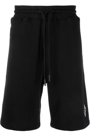 MARCELO BURLON Bermudas con logo estampado