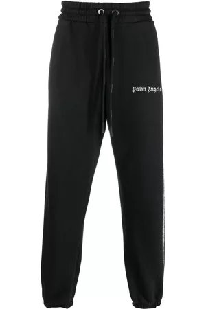Palm Angels Pantalones de chándal con logo estampado