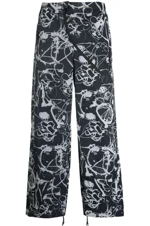 Alexander McQueen Pantalones rectos con estampado abstracto