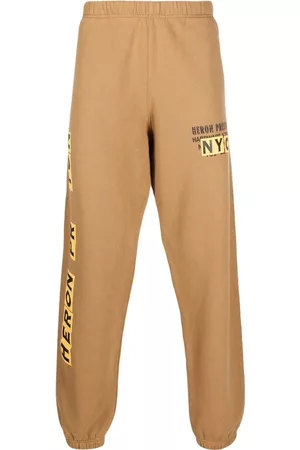 Heron Preston Pantalones de chándal con logo estampado