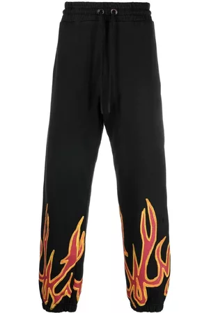 Palm Angels Pantalones joggers con detalle de llamas