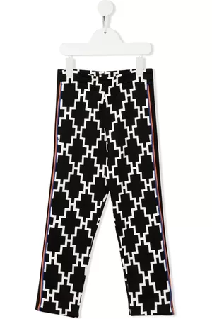 MARCELO BURLON Leggins de talle medio con logo