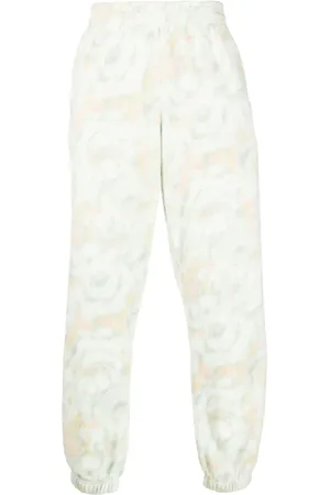 MARTINE ROSE Pantalones de chándal con estampado floral