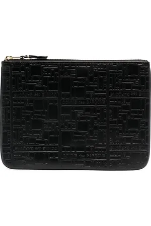 Comme des Garçons Bolso de mano con logo en relieve