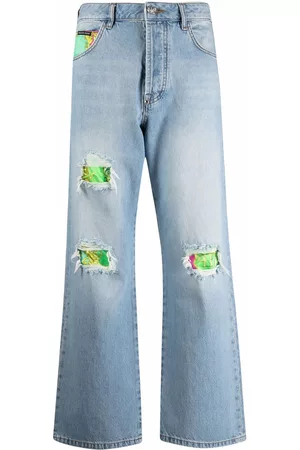 Philipp Plein Vaqueros capri con efecto envejecido