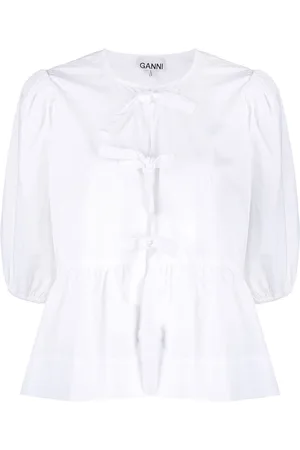 Ganni Blusa con peplum