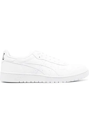 Comme des Garçons Zapatillas bajas con estampado gráfico