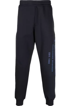 Alexander McQueen Pantalones de chándal con estampado de grafiti