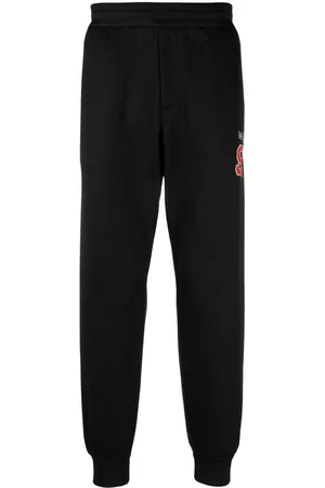 Alexander McQueen Pantalones de chándal con logo estampado