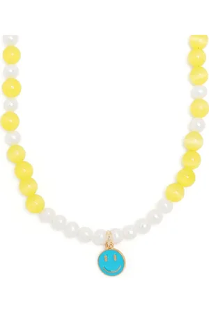 A Sinner in Pearls Collar de perlas con colgante cat eye