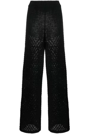 ROTATE Pantalones holgados de talle alto