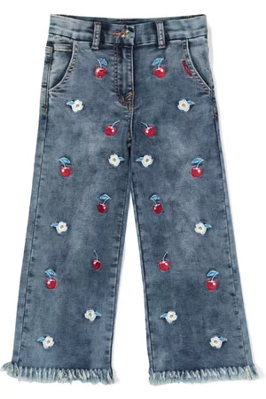 MONNALISA Vaqueros con bordado floral y bajos deshilachados
