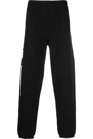 Heron Preston Pantalones de chándal con logo estampado