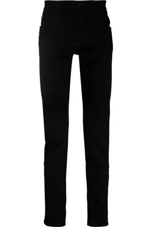 Dolce & Gabbana Vaqueros slim con parche del logo