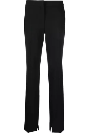 Stella McCartney Pantalones slim con abertura en el dobladillo
