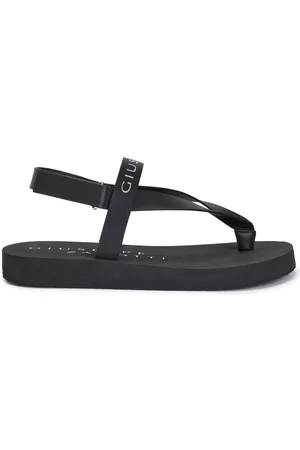 Giuseppe Zanotti Sandalias con tira para el dedo y logo estampado