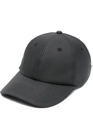 Rains Gorra impermeable con visera curva