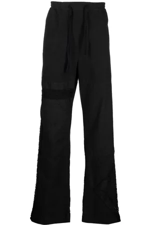 Marine Serre Pantalones con panel de encaje