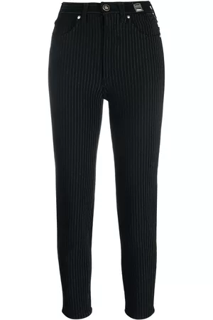 VERSACE Pantalones skinny a rayas diplomáticas 2000