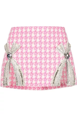 AREA Minifalda con lazo y aplique de cristal
