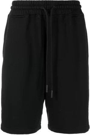 MARCELO BURLON Knee-length track shorts