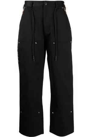 CLOT Pantalones Carpenter con motivo de leopardo