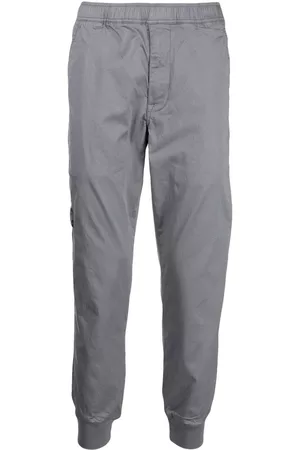 A Bathing Ape Pantalones ajustados con logo estampado