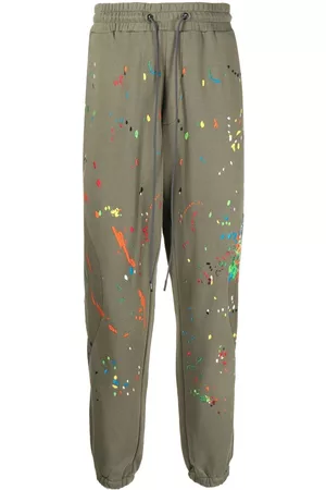 MOSTLY HEARD RARELY SEEN Pantalones joggers Warped con salpicadura de pintura