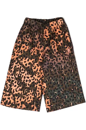 MARCELO BURLON Pantalones con motivo de leopardo