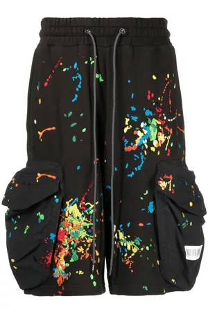 MOSTLY HEARD RARELY SEEN Bermudas cargo con pintura bordada