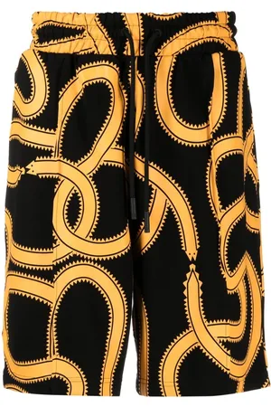 MARCELO BURLON Pantalones cortos de chándal con estampado Snakes