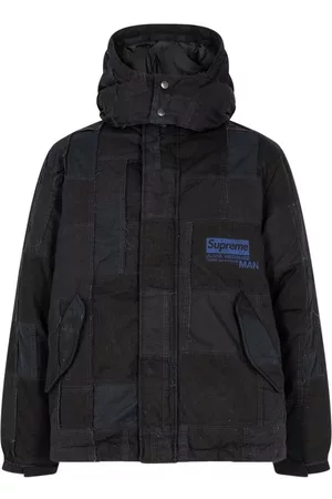 Supreme Plumífero con diseño patchwork de x Junya Watanabe